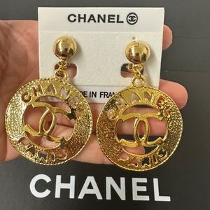 CHANEL GOLD TONE METAL CLIP ON EARRINGS